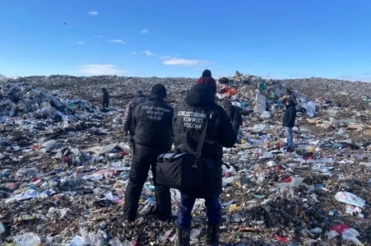 труп новорожденного на свалке